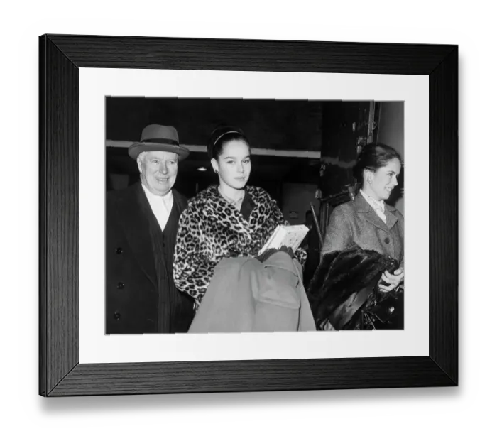 Framed Print : Charlie Chaplin With Wife and Daughter Framed Print : Charlie Chaplin With Wife and Daughter