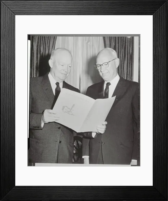 Framed Print : Dwight D. Eisenhower Reading Material with Businessman Framed Print : Dwight D. Eisenhower Reading Material with Businessman