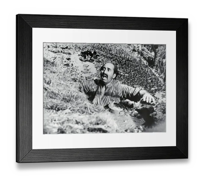Framed Print : Man Sinking in Quicksand in Movie Scene Framed Print : Man Sinking in Quicksand in Movie Scene