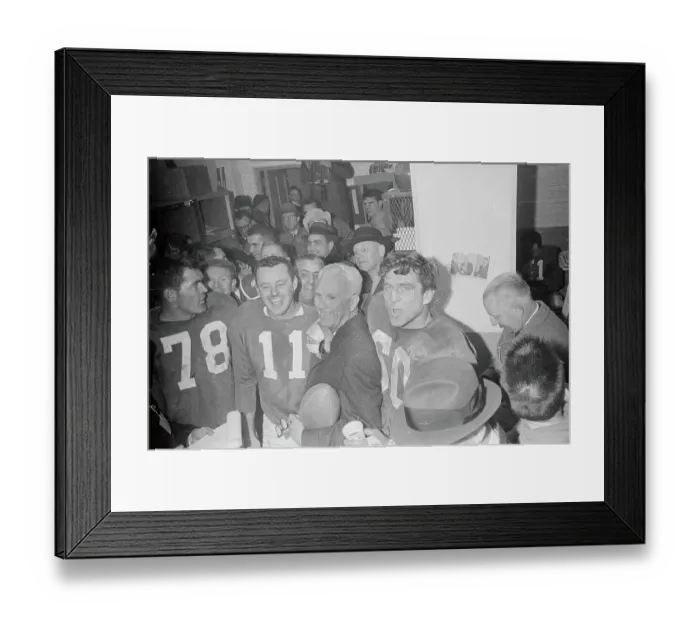 Framed Print : Football Team Celebrating Victory Framed Print : Football Team Celebrating Victory