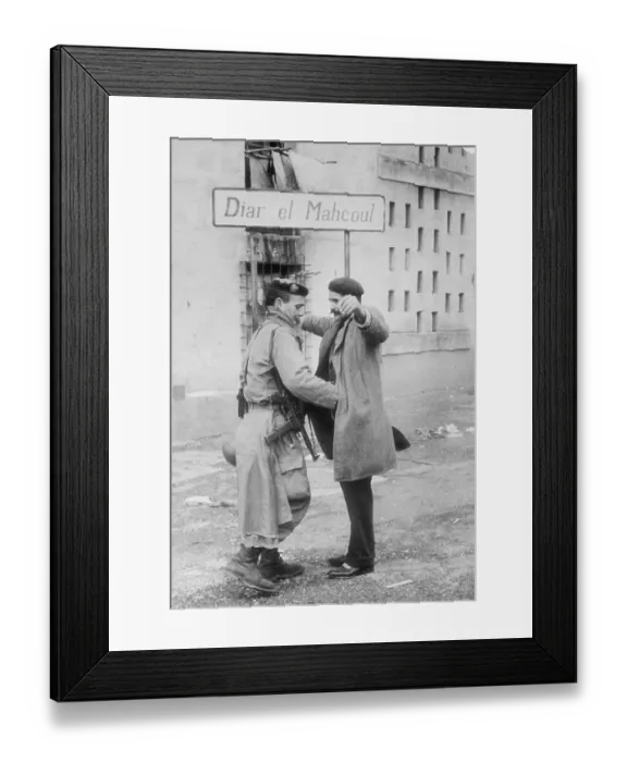 Framed Print : Paratrooper Searches Moslem on Street Framed Print : Paratrooper Searches Moslem on Street
