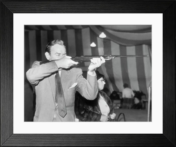 Framed Print : Michael Wilding Taking Aim Framed Print : Michael Wilding Taking Aim