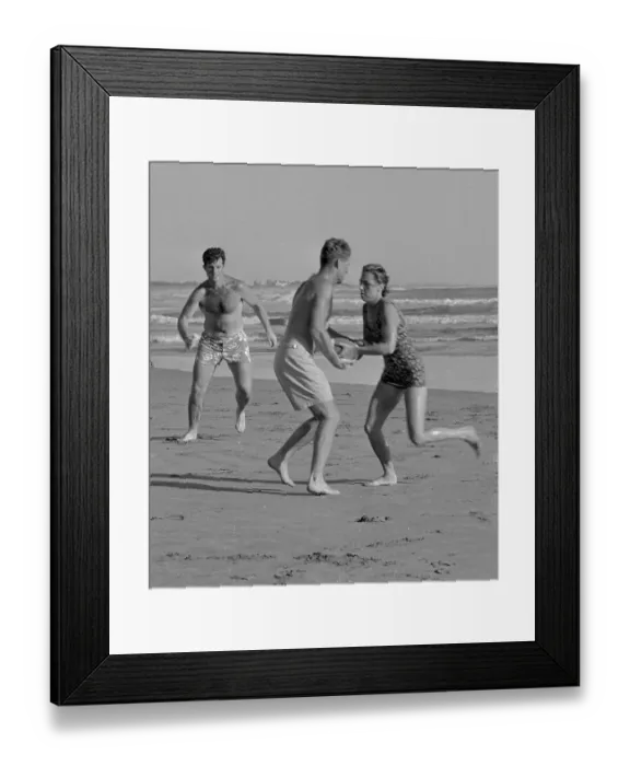 Framed Print : Kennedys Playing Football on Beach