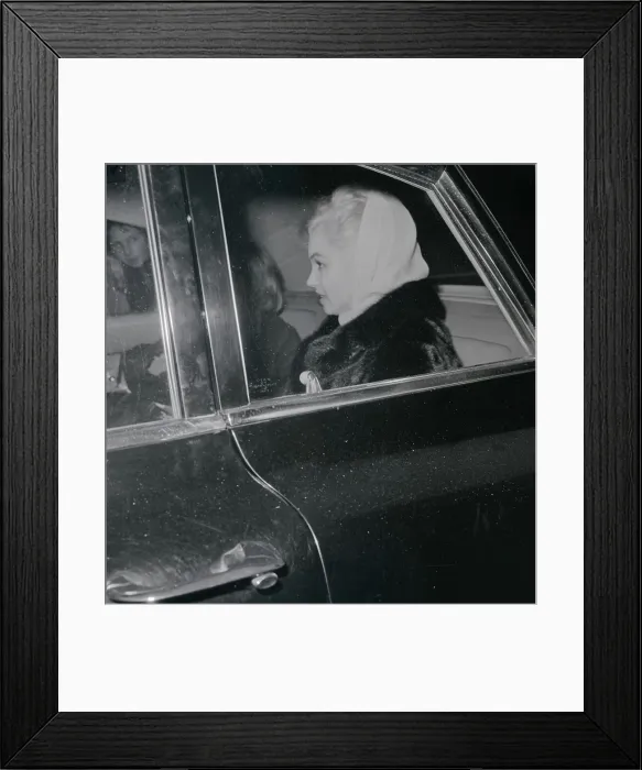 Framed Print : Marilyn Monroe Wearing a Scarf and Sitting in Car Framed Print : Marilyn Monroe Wearing a Scarf and Sitting in Car