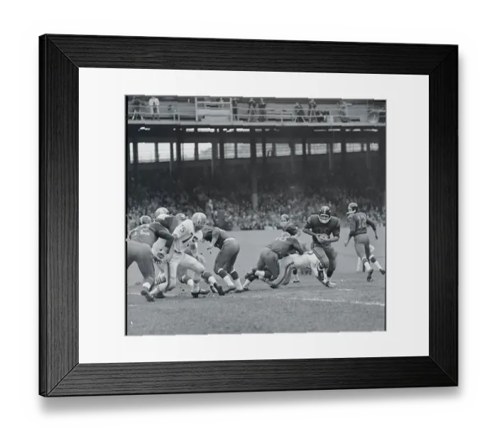 Framed Print : Football Player Escaping with Ball Framed Print : Football Player Escaping with Ball