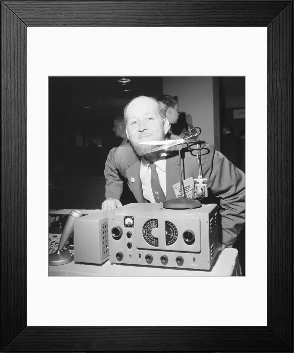 Framed Print : Man Trims Beard with Radio Controlled Scissors Framed Print : Man Trims Beard with Radio Controlled Scissors