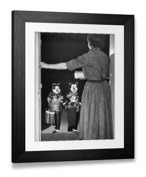 Framed Print : Children Trick-or-Treat in Safe Costumes Framed Print : Children Trick-or-Treat in Safe Costumes