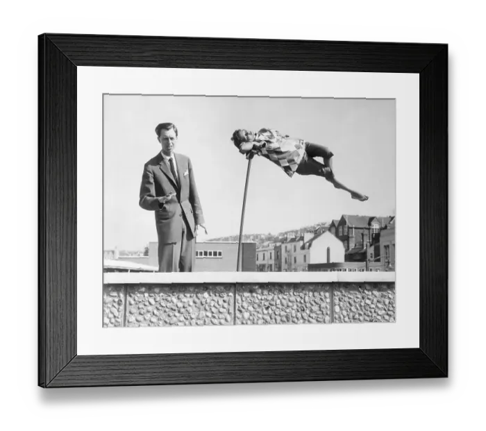 Framed Print : Magician and Assistant Performing Levitation Feat Framed Print : Magician and Assistant Performing Levitation Feat