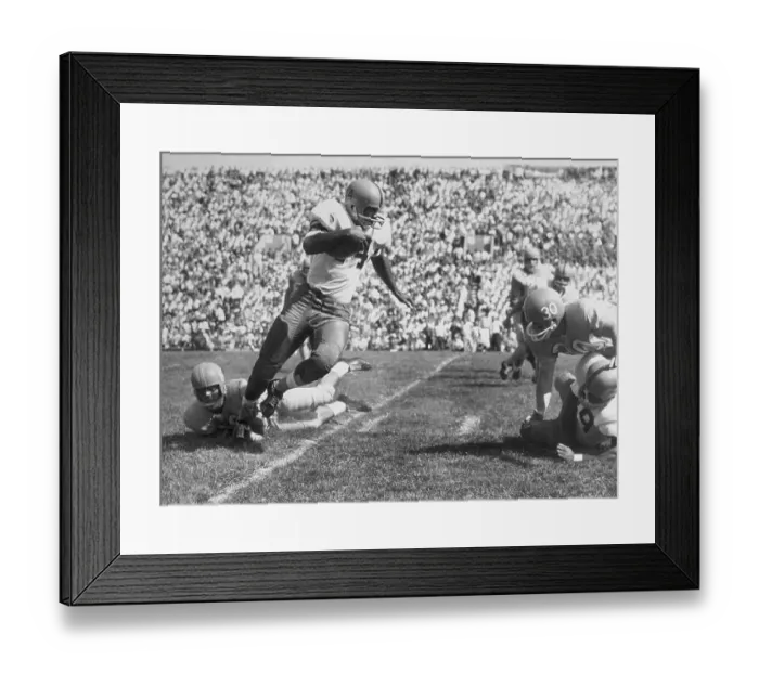 Framed Print : Football Player Escaping Tackle Framed Print : Football Player Escaping Tackle