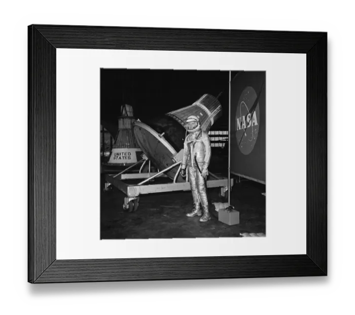 Framed Print : Astronaut In Space Suit In Front Of Caps Framed Print : Astronaut In Space Suit In Front Of Caps