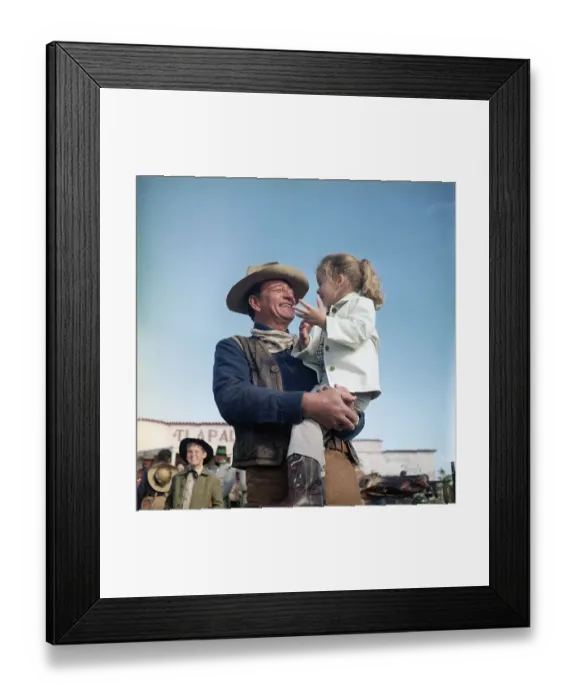Framed Print : John Wayne and Daughter Aissa on Movie Set Framed Print : John Wayne and Daughter Aissa on Movie Set