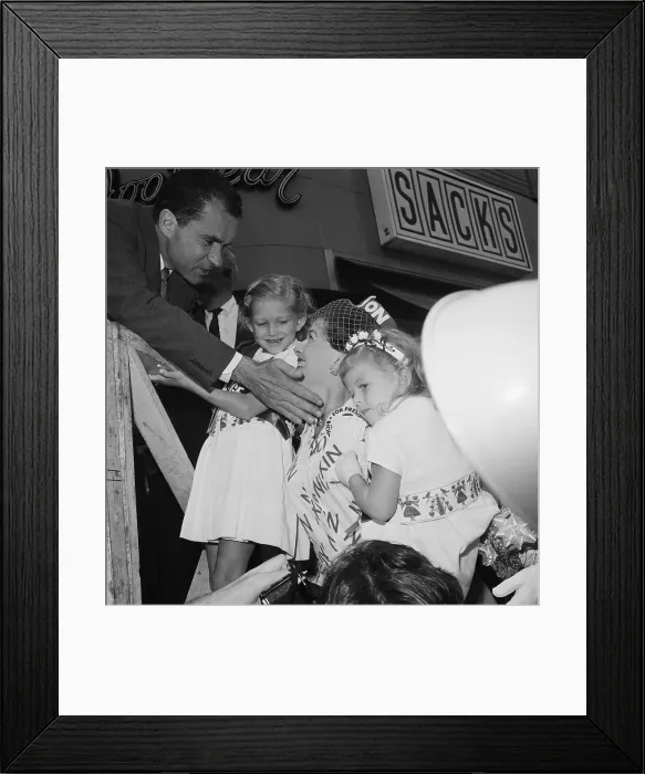 Framed Print : Nixon Pats Womans Cheek While Kids Watch Framed Print : Nixon Pats Womans Cheek While Kids Watch