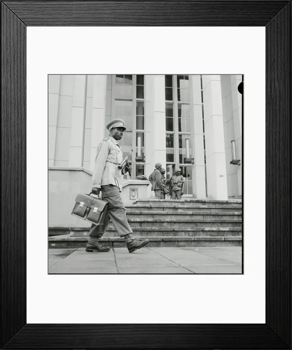 Framed Print : Armed Congolese Civil Servant Strolling to His Job Framed Print : Armed Congolese Civil Servant Strolling to His Job