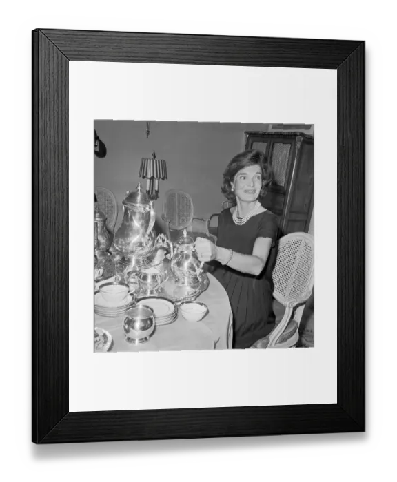 Framed Print : Portrait of Jackie Kennedy Pouring Tea Framed Print : Portrait of Jackie Kennedy Pouring Tea