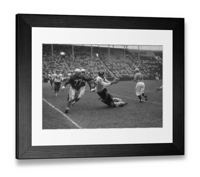 Framed Print : Austin Gonsoulin Being Tackled While Intercepting Pass Framed Print : Austin Gonsoulin Being Tackled While Intercepting Pass
