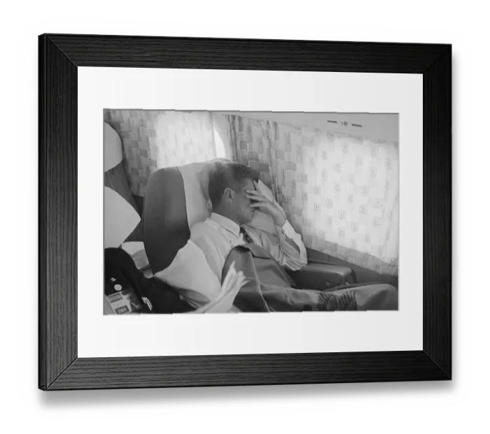 Framed Print : John F. Kennedy Resting in Passenger Cabin of Airplane Framed Print : John F. Kennedy Resting in Passenger Cabin of Airplane
