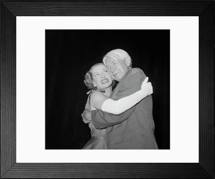 Framed Print : Actress Bette Davis Hugging Writer Carl Sandburg Framed Print : Actress Bette Davis Hugging Writer Carl Sandburg