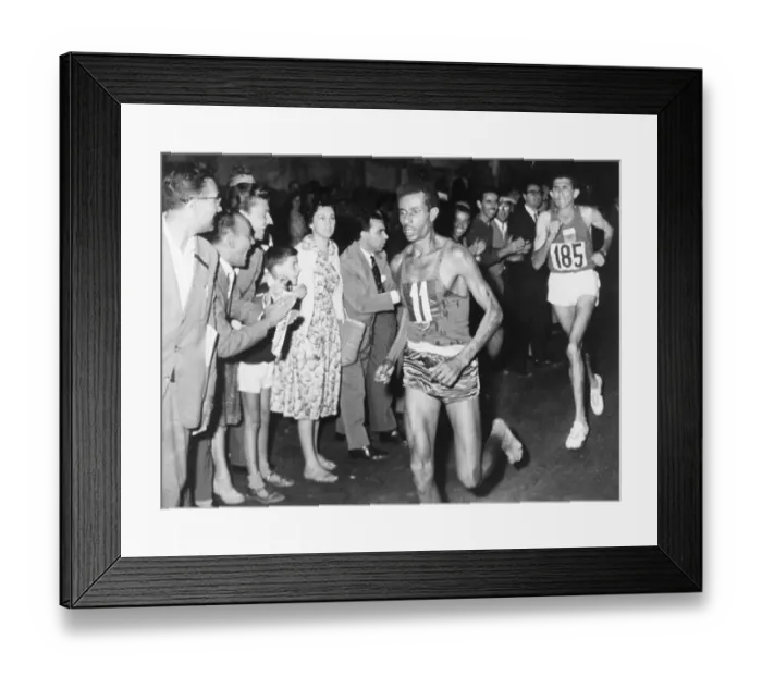 Framed Print : Ethiopian Runner Abebe Bikila Winning Olympic Marathon Framed Print : Ethiopian Runner Abebe Bikila Winning Olympic Marathon