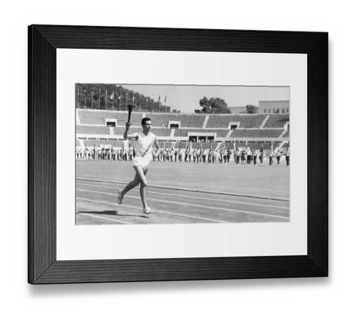 Framed Print : Athlete Jogs & Carries Olympic Torch Framed Print : Athlete Jogs & Carries Olympic Torch