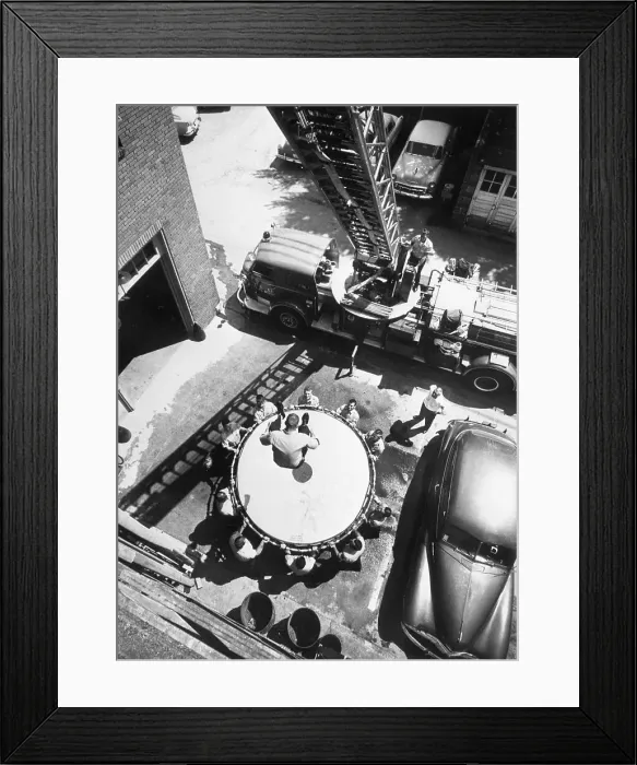 Framed Print : Firefighters Practice Jumping Into Net Framed Print : Firefighters Practice Jumping Into Net