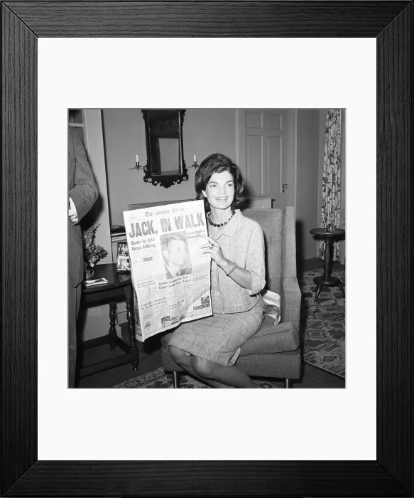 Framed Print : Jacqueline Kennedy Holding Newspaper