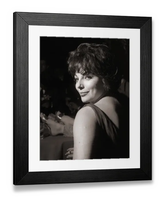 Framed Print : Joan Collins Smiles Over Her Shoulder Framed Print : Joan Collins Smiles Over Her Shoulder