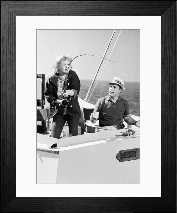 Framed Print : Lucille Ball Holding a Fishing Pole Framed Print : Lucille Ball Holding a Fishing Pole