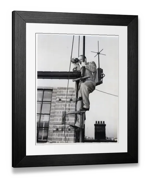 Framed Print : Cameraman on Flagpole with Portable Television Camera