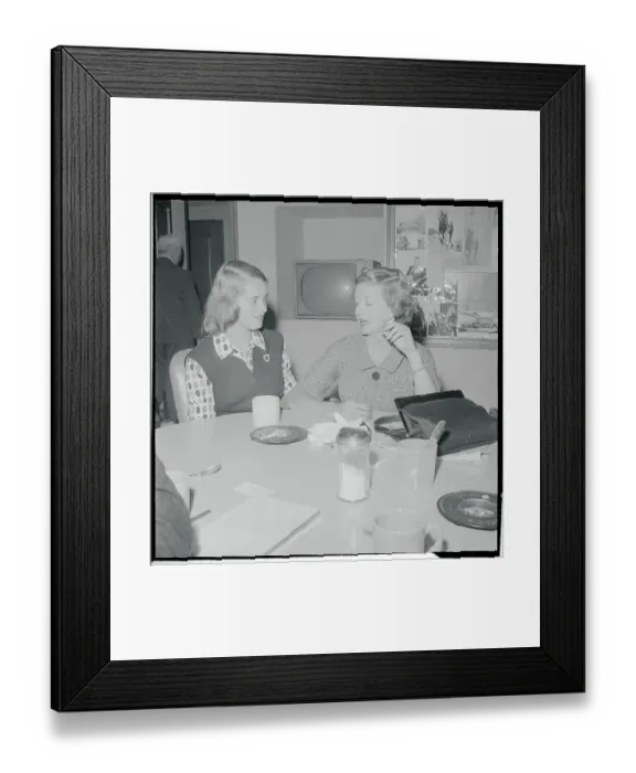 Framed Print : Actress Bette Davis and Daughter Sitting at Table Together