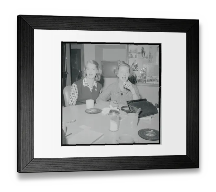 Framed Print : Actress Bette Davis and Daughter Sitting at Table Together Framed Print : Actress Bette Davis and Daughter Sitting at Table Together