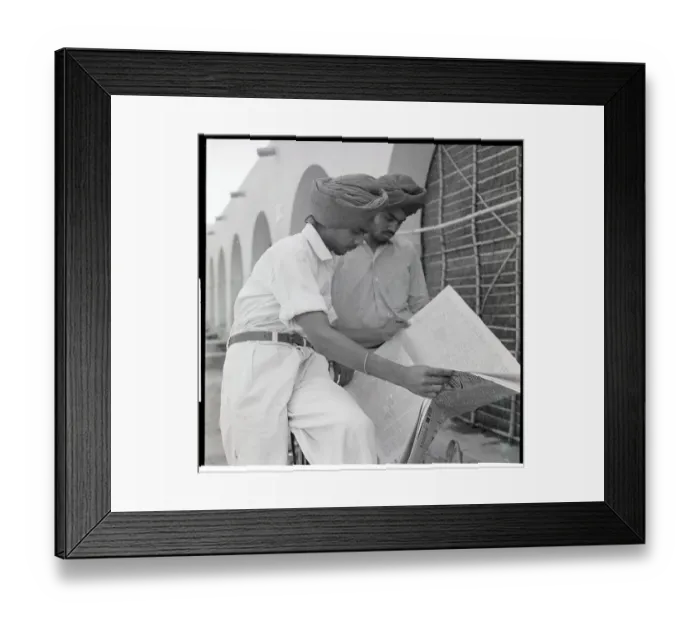 Framed Print : Sikh Men Search Newspaper For Jobs Framed Print : Sikh Men Search Newspaper For Jobs