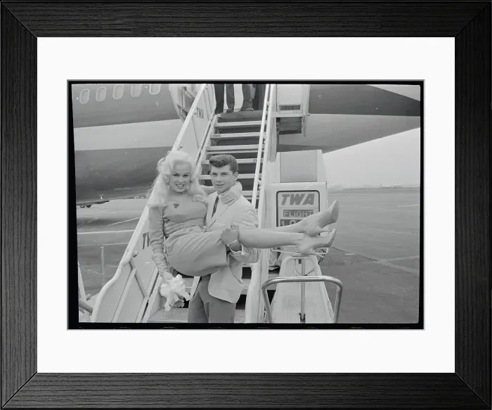 Framed Print : Mamie Van Doren Being Carried by Anthony Santoro on Airplane Steps Framed Print : Mamie Van Doren Being Carried by Anthony Santoro on Airplane Steps