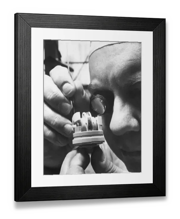 Framed Print : Man Adjusting Small Gyroscope Framed Print : Man Adjusting Small Gyroscope