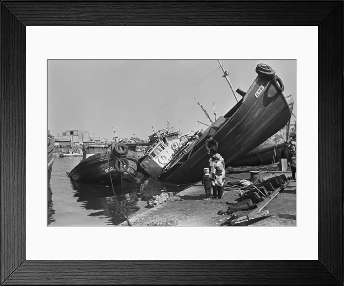 Framed Print : Woman And Kids Look At Ship Upturned Framed Print : Woman And Kids Look At Ship Upturned