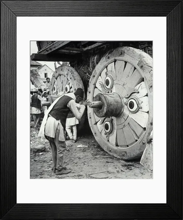 Framed Print : Man Bows Before Chariot of Saint Machchandra Nath Framed Print : Man Bows Before Chariot of Saint Machchandra Nath
