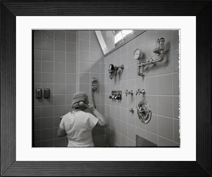 Framed Print : Nurse Using Hospital Intercom Framed Print : Nurse Using Hospital Intercom