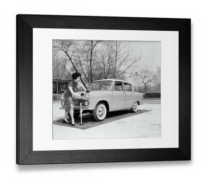 Framed Print : Jacking Toyopet Subcompact Car Framed Print : Jacking Toyopet Subcompact Car