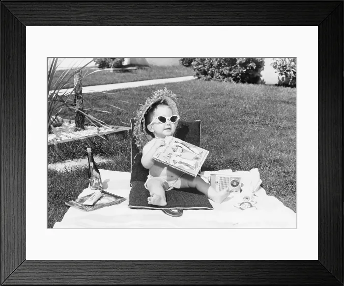 Framed Print : Baby Sunbathing on Lawn Framed Print : Baby Sunbathing on Lawn