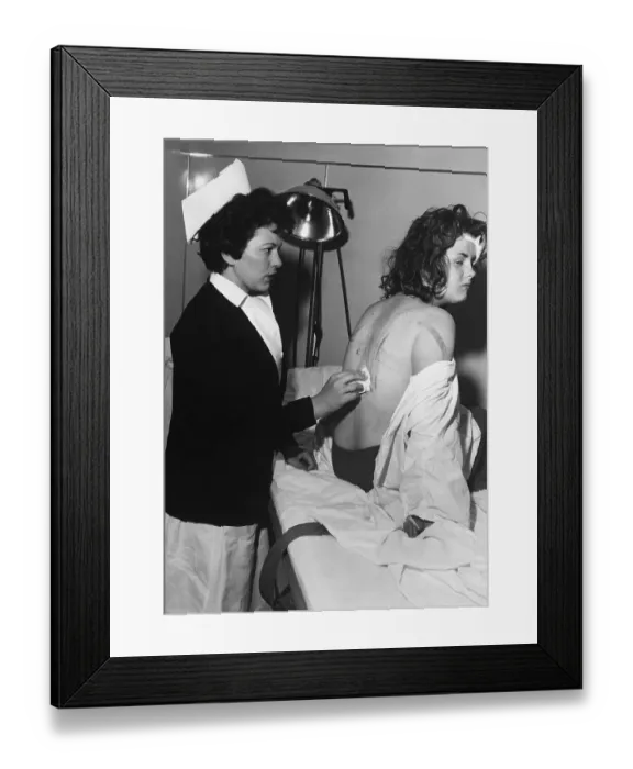 Framed Print : Nurse Treating Welts on Woman's Back Framed Print : Nurse Treating Welts on Woman's Back