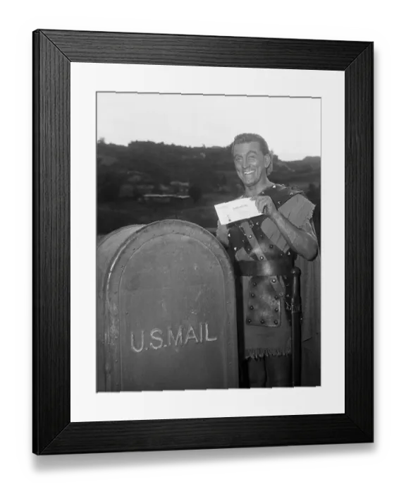 Framed Print : Kirk Douglas Mailing Letter in Spartacus Costume Framed Print : Kirk Douglas Mailing Letter in Spartacus Costume