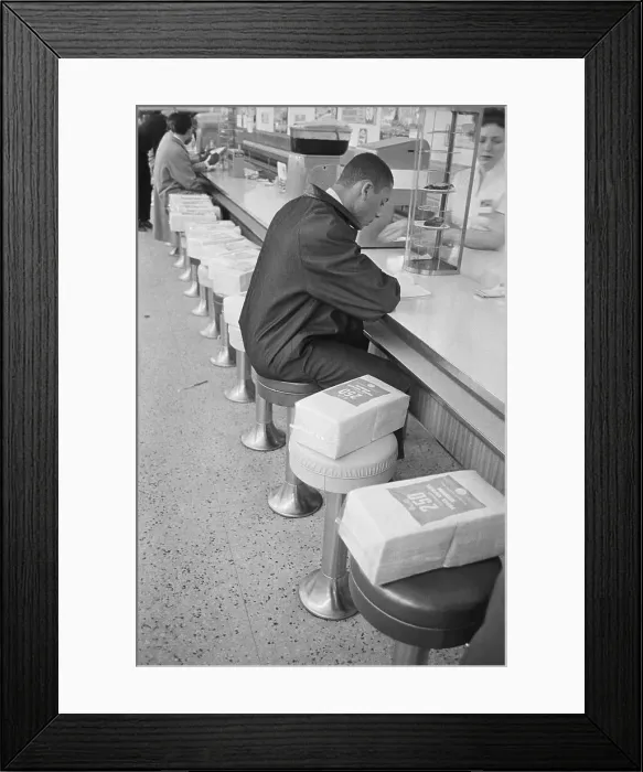 Framed Print : African American Man Staging Lunch Counter Sit-in Framed Print : African American Man Staging Lunch Counter Sit-in