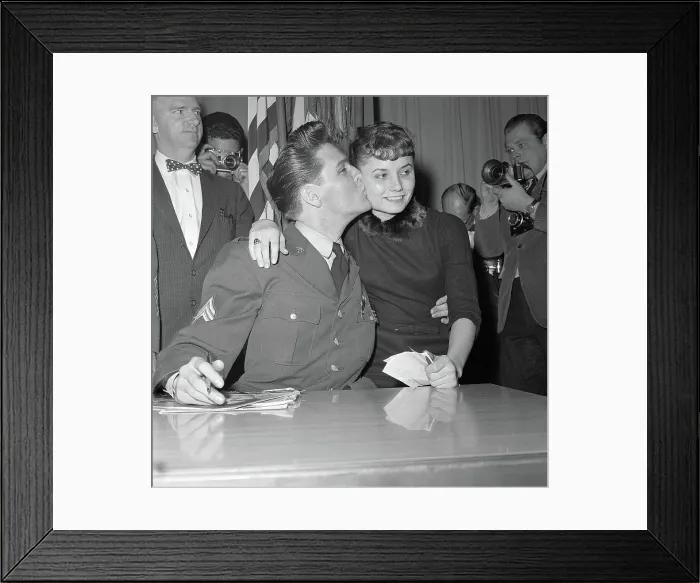 Framed Print : Elvis Kisses Woman at Press Conference Framed Print : Elvis Kisses Woman at Press Conference