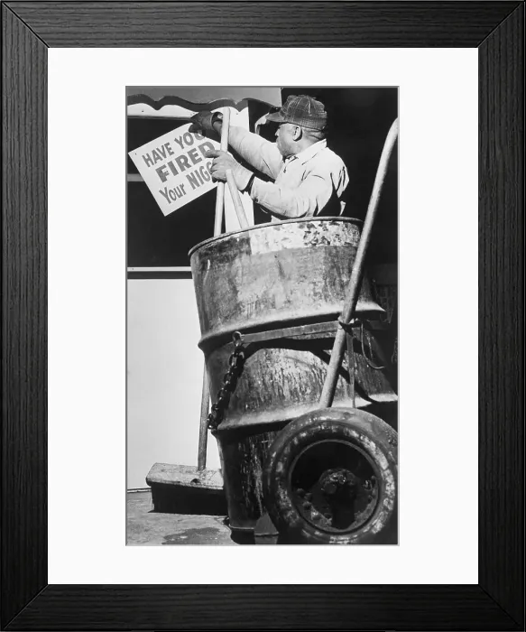 Framed Print : Street Cleaner Tears Down Racist Sign Framed Print : Street Cleaner Tears Down Racist Sign