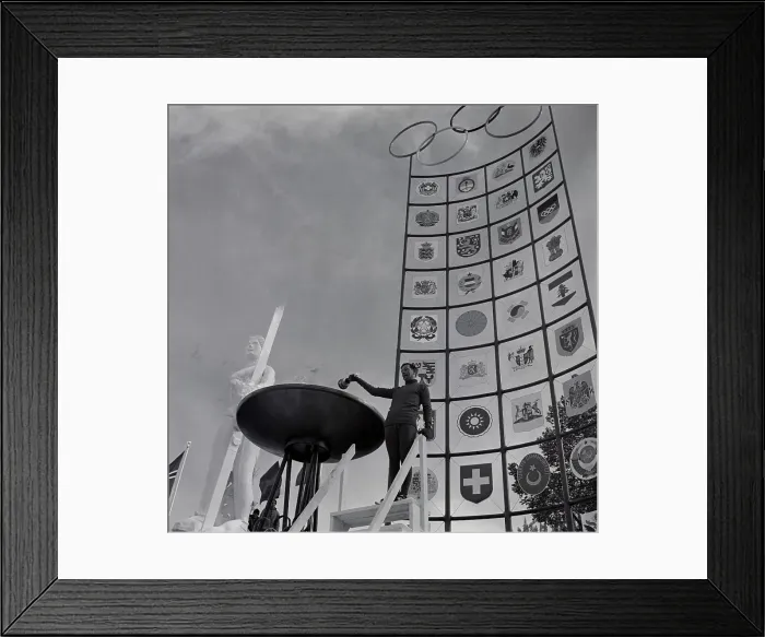 Framed Print : Athlete Lighting Olympic Fire