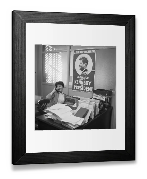 Framed Print : John F. Kennedy Looking at campaign Poster Framed Print : John F. Kennedy Looking at campaign Poster