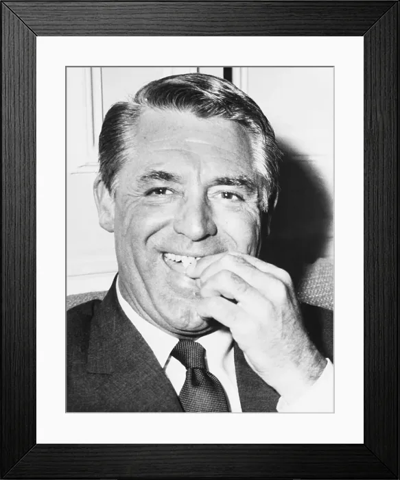 Framed Print : Cary Grant Taking a Pill Framed Print : Cary Grant Taking a Pill