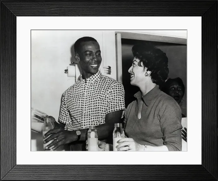 Framed Print : Ernie Banks and Wife Preparing Baby Bottles