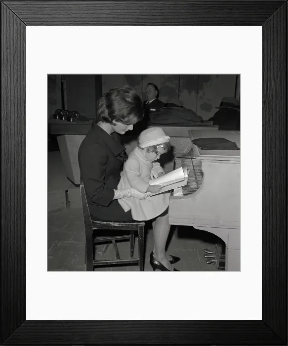 Framed Print : Jacqueline Kennedy Holding Daughter Framed Print : Jacqueline Kennedy Holding Daughter