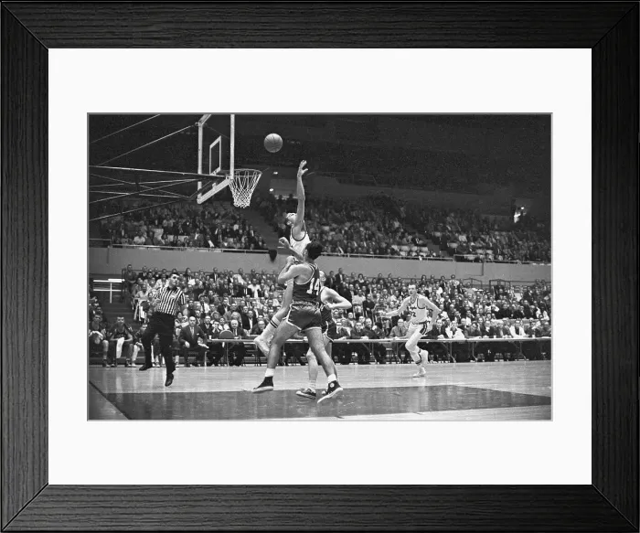 Framed Print : Player Going to Block Bob Cousy's Shot