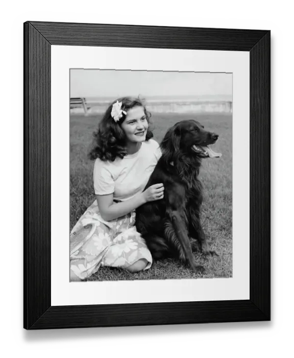 Framed Print : Best Pals. A young woman sits with her Irish Setter dog in a park, US, circa 1960